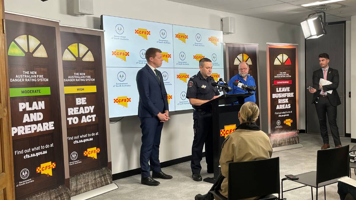 Emergency Services Minister Joe Szakacs, CFS operations executive director Brett Loughlin and cereal farmer Duncan Campbell-Wilson launched the new Australian Fire Danger Rating System at the Emergency Services Headquarters in Keswick Wednesday morning. Picture by Katie Jackson.