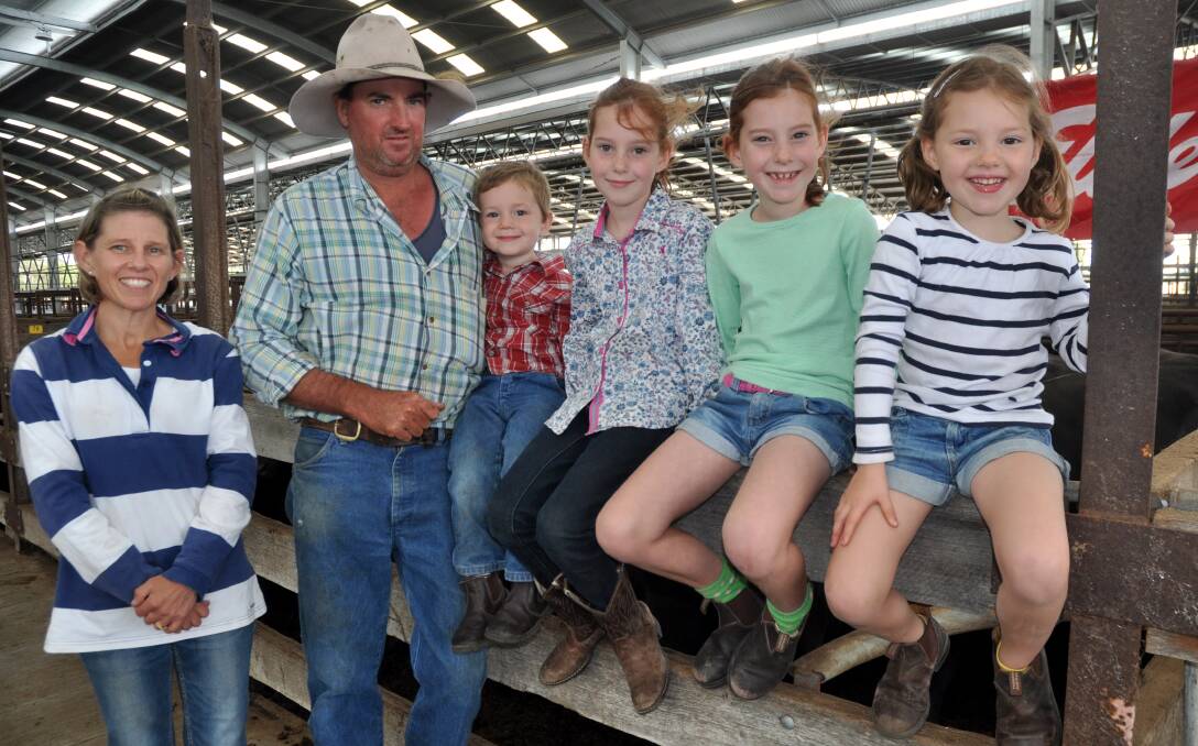 VOLUME VENDORS: Natalie and Stuart Hann, Nampara Pastoral Co, Biscuit Flat, with children Austin, Emily, Maddi and Charlotte, sold 405 heifers.