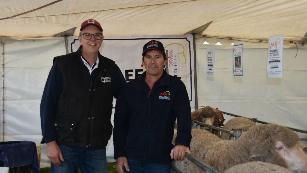 Simon Seppelt with client Warren Beattie, Mallee Hill stud, Ceduna at the 2023 South East Merino Field Day at Keith. Picture by Liam Wormald.