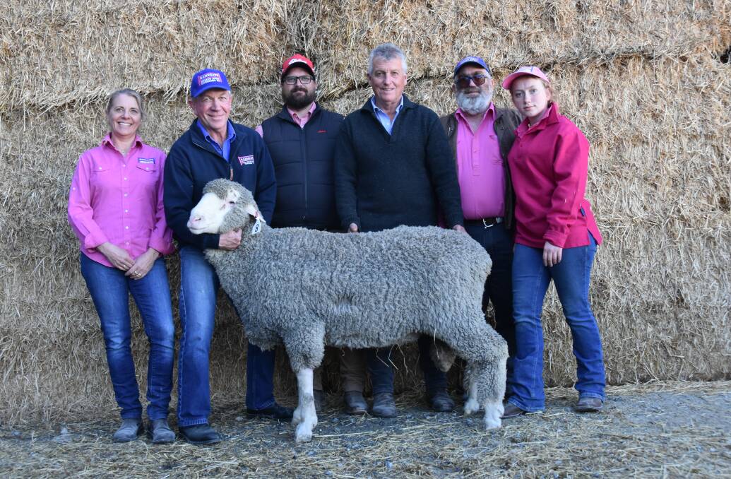 Heidi and Craig Keller, Elders Keith's Rohan Austin, Classings Limited's Bill Walker, Jed and Tilly Keller with the $8000 sale topper which sold to Nantoura stud, Wharminda. Picture by Catherine Miller
