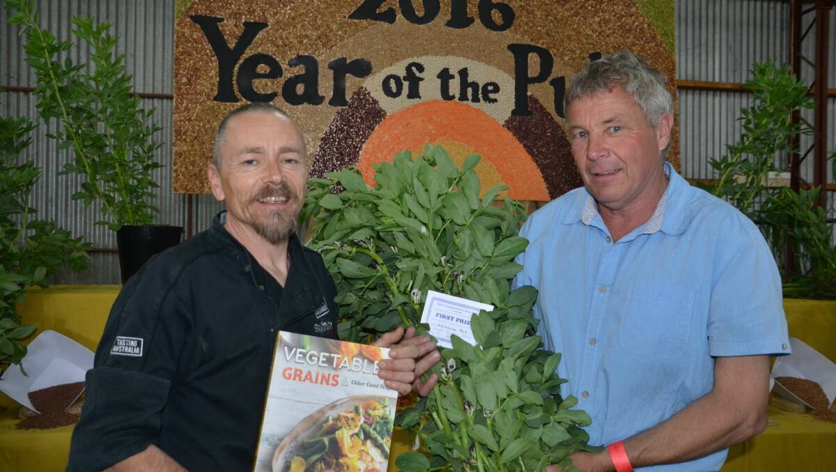 Chef Simon Bryant presents Michael Allen, Warrawee Park, Keith with a copy of his book for the winning pulse entry.