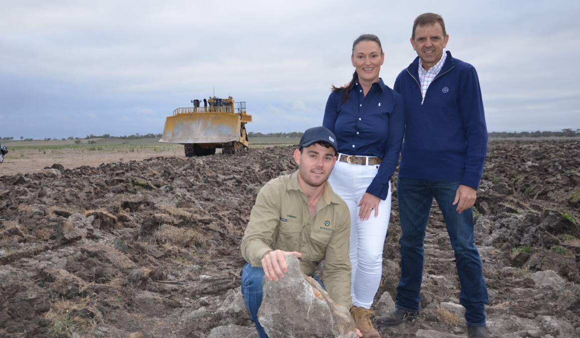 Phillip, Katherine and Nick McBride in one of their shallow soil paddocks at Conmurra Station after it was deep ripped with their CAT D11 bulldozer. After rock munching the paddock will be repastured. 
