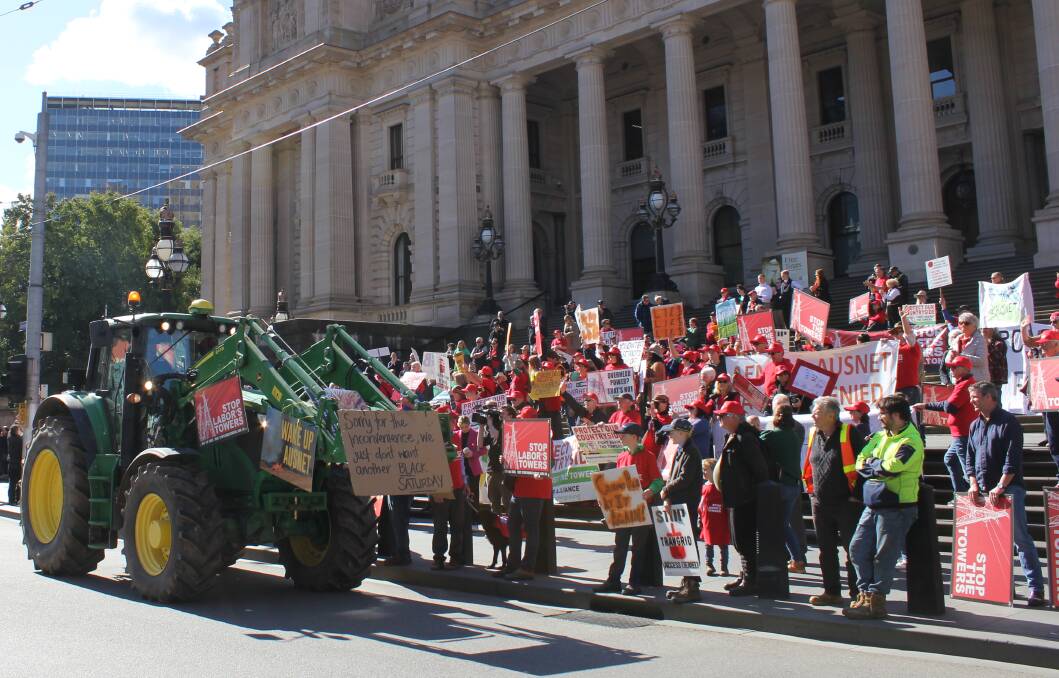 Upset farmers took their protest over high voltage powerlines to State Parliament last year. Picture from Holly McGuinness.
