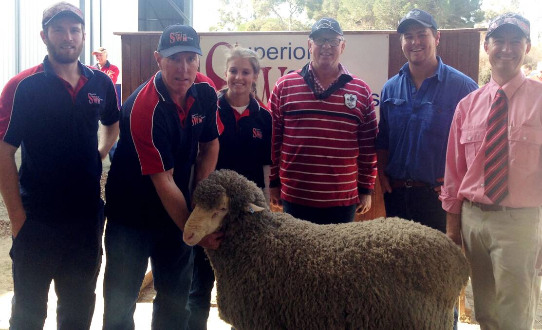 POLLED WELL: Superior Wool Merinos' Kael and Richard Harkness and Rachel Kielaw, with top ram buyers James and Jamo Irwin and Elders auctioneer Steve Doecke.