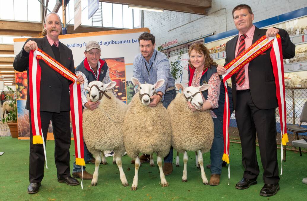 TOP THREE: Elders stud stock's Tom Penna and Tony Wetherall (right) with the supreme interbreed group from the Jackson Border Leicester stud, Moyston, Vic, held by Ross Jackson, Lachie James and Lydia Jackson.