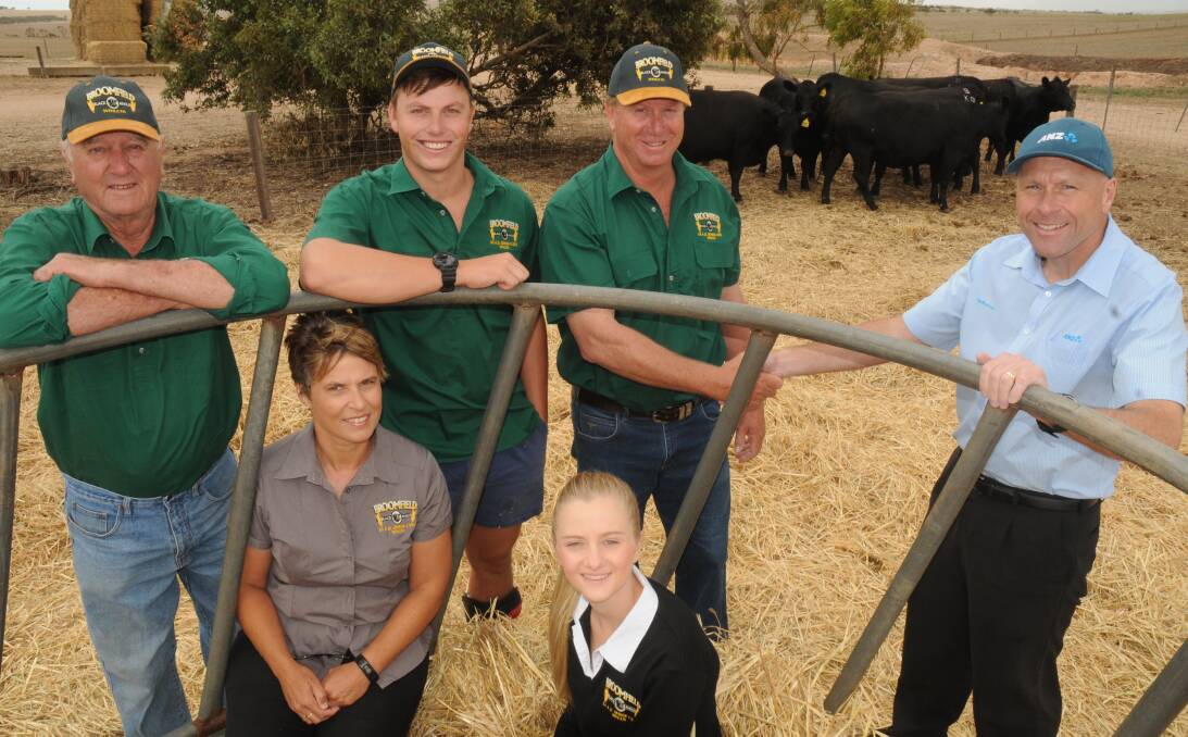 TOP HEIFERS: ANZ agribusiness manager Ron Sutcliffe (right) congratulates Bob, Jenny, Luke and Brett Graham and Lucy Kempster from Broomfield Angus stud, Winulta, on their 2016 ANZ Heifer Challenge win.