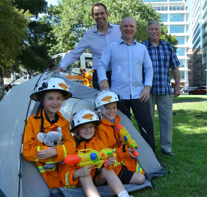 CFS 'cadets' Dari and Willow Rann with Tai Appelt, are getting ready to go camping along the CFS Foundation Fire Trail, along with CFS Foundation media Ambassador Brenton Ragless, trail taskforce chair Kristian Appelt, and foundation CEO Rob Styling.