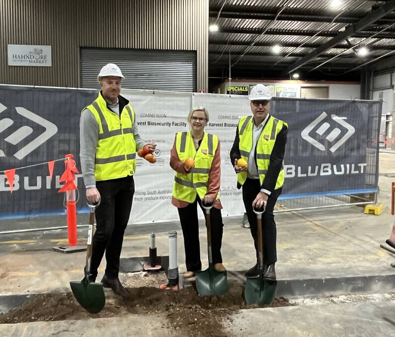 Blubuilt's Toby Thurstans, Primary Industries Minister Clare Scriven and SA Produce Markets CEO Angelo Demasi mark the start of construction on the biosecurity precinct. Picture by Elizabeth Anderson
