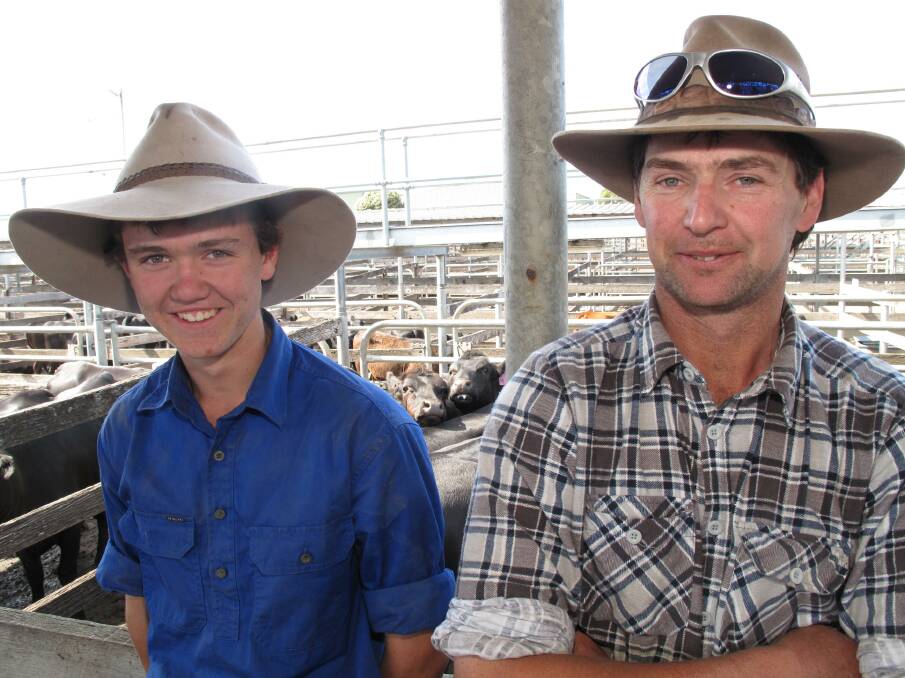 TAKING STOCK: Nathan and Tim McCosh, Mailors Flat, Vic, at the Warrnambool, Vic, first cross female sale. 
