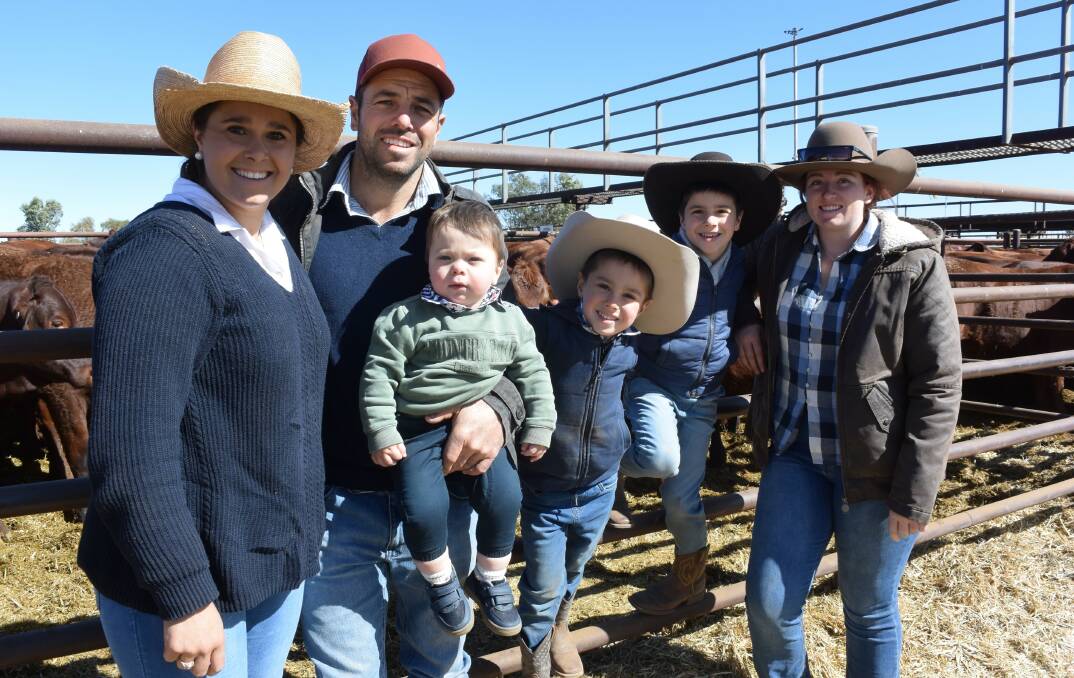 Delmore Downs pastoralists Georgie Hamlyn and Brad Vickers with Charlie, William and Henry Vickers, and Layne Pontifex, at the Alice Springs Show Sale last year. Picture by Vanessa Binks. 