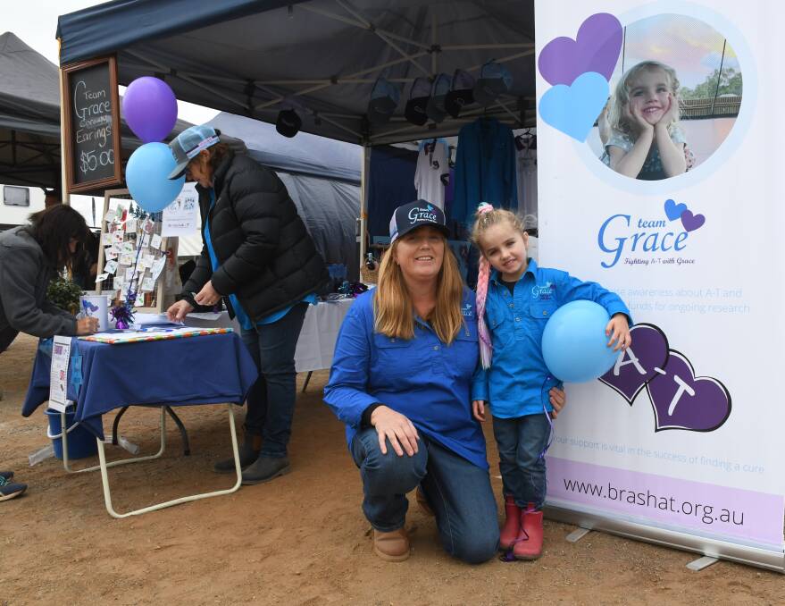 Grace Murray and mum Kerry Bourke, Wonnaminta Station, Packsaddle, NSW, were raising funds for Ataxia Telangiectasia (A-T) research at Agfair Broken Hill. Picture by Quinton McCallum