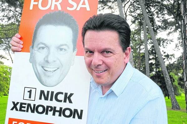 TWO FACES: Sen Nick Xenophon is running a split ticket at this weekend’s election that he says favours the Liberal Party and the Labor Party evenly.