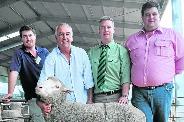 STRONG RESULT: Eric Ashby, Mt Alma stud, Coonalpyn, with buyer of the $3600 top price ram Stuart Murdoch, Warooka, Landmark stud stock auctioneer Gordon Wood, and Elders Tintinara territory sales manager Dave Whittenbury.