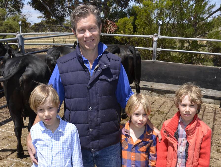 Tim Henry, Echunga, sold 4 PTIC cows for $1310 to TFI at the Strathalbyn market. He is pictured with sons Tom, Jack and Angus.