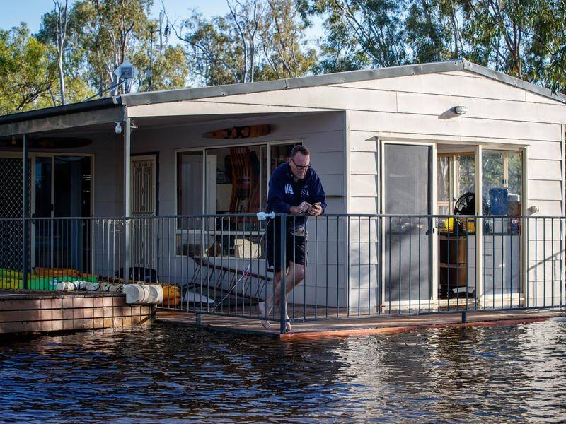 Flood victims are advised to contact their electricity retailer for a reconnection service request. (Matt Turner/AAP PHOTOS)