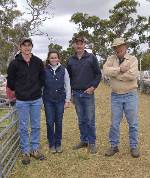 BUYERS: Tim, Mary and Peter Williams, Lucindale, with Lawrie Polomka.