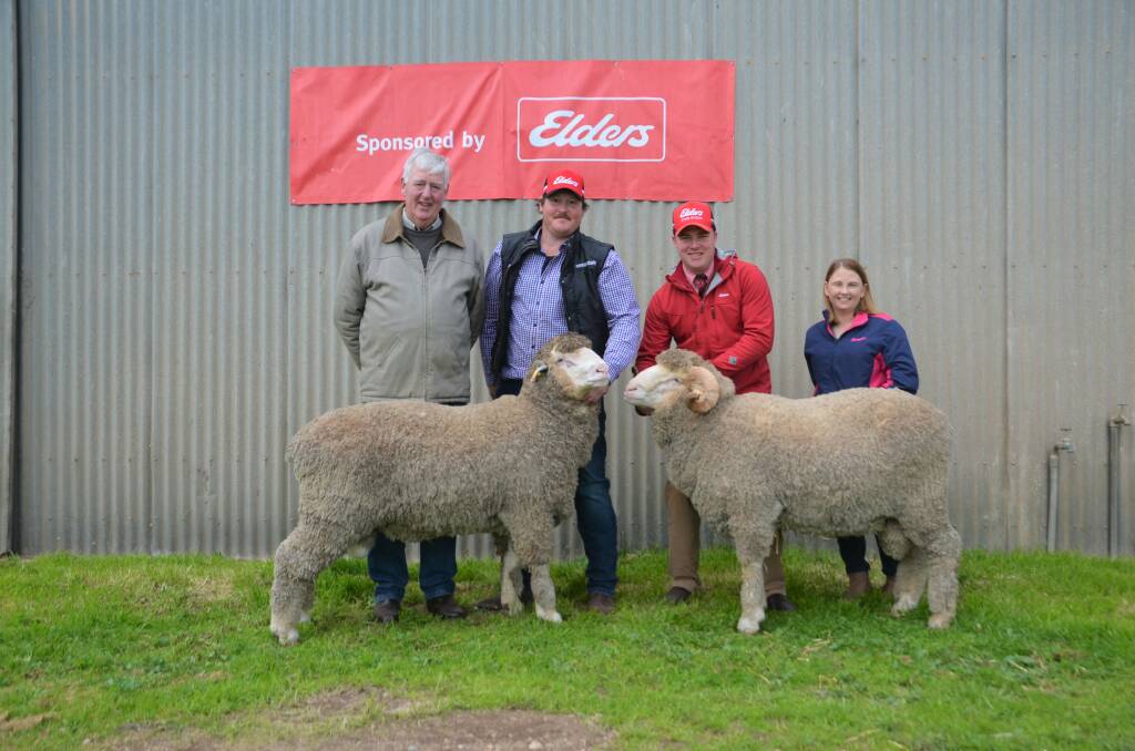 Bruce McCarthy, 278 Securities, with two of the rams he purchased at Orrie Cowie's ram sale last year. Also pictured are Orrie Cowie principal John Dalla, Elders stud stock's Alistair Keller and 278 Securities' Christie Bower. Picture by Quinton McCallum.